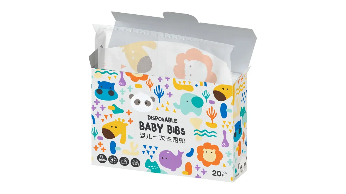 Caixa de babadores descartáveis Marcus e Marcus com estampa de bichinhos