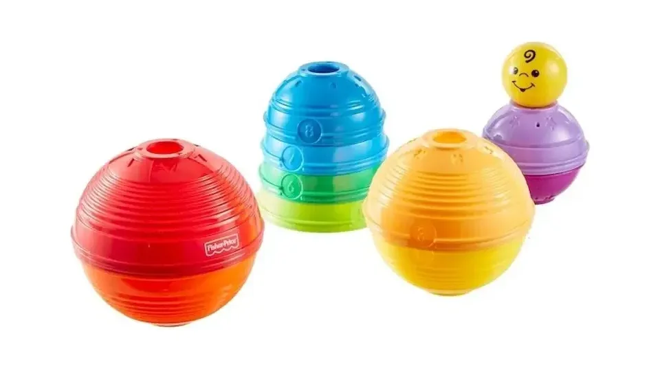 Potinhos de empilhar coloridos Fisher-Price com bonequinho no topo (foto 3)